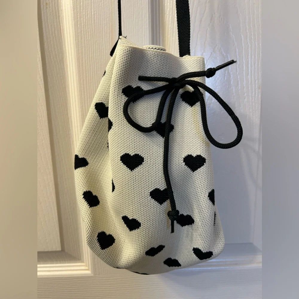 Cross body white with black hearts purse